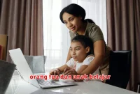 orang tua dan anak belajar